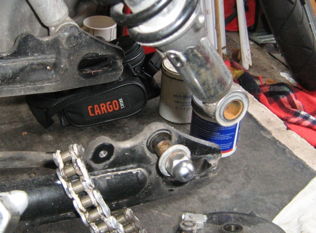 the lower bolt has been removed to allow the chain to pass
